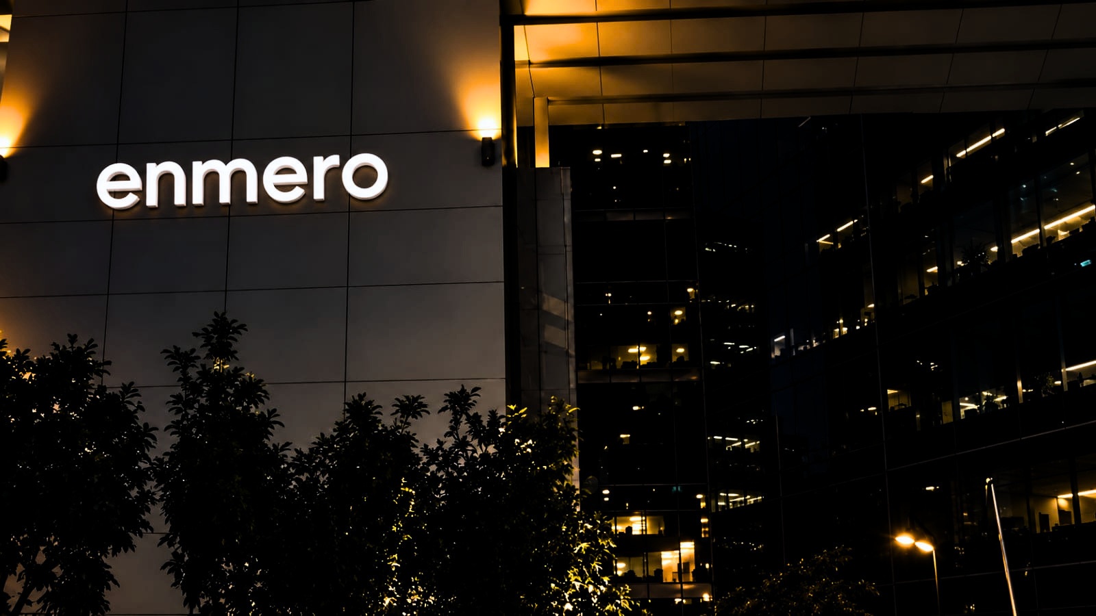 Enmero Corporate Headquarters Building Illuminated at Night